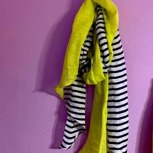 Chicos scarf is blue and white striped with lemon
